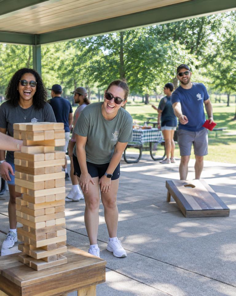 Company picnic with giant Jenga and cornhole at a Broome County park pavilion